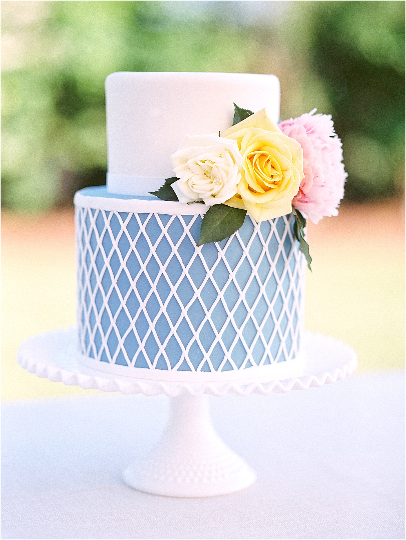 maritime blue and white floral wedding cake